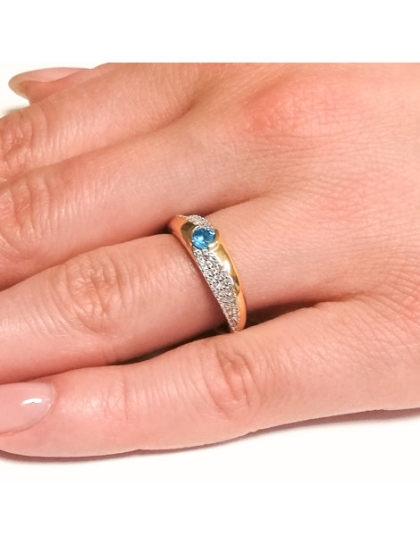 ZŁOTY PIERŚCIONEK ZARĘCZYNOWY Z BŁĘKITNĄ CYRKONIĄ PR. 585